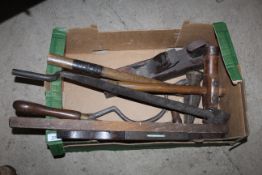 A box of tools including jack plane, level etc.