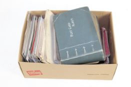 A box of militaria including Royal Navy Inter-War post-card album, a quantity of British Army post-