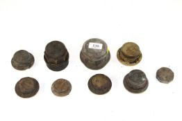 Nine various brass and metal hub caps, some named to Elvin, J.S. Dunnett of Ipswich, Cramer