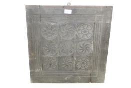 A circa 18th Century carved oak panel
