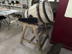 A vintage butter churn on stand