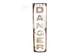 An enamel sign on shaped rolled iron base for 
