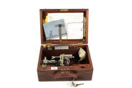 An antique Dobbie-McInnes of Glasgow engine cylinder pressure indicator gauge, with associated