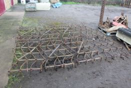 Eight various lightweight harrows