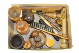 A collection of antique Treen including knitting sheaths, box wood measure, needle cases, box wood