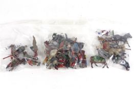 A box of lead toy soldiers / figures including knights and horses, native Americans and soldiers