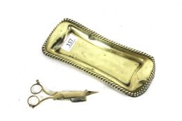 A 19th Century brass candle snuffer and tray