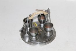 A four piece cruet set and small brass figure of a tortoise