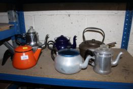 Six various tea pots and kettles