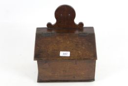 An 18th Century oak wall hanging candle box