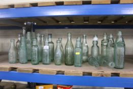 A quantity of glass soda and other bottles, some named to makers of Ipswich