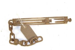 A rare 19th Century Folk Art carved chain and lantern form wool hook