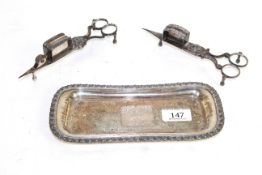 Two silver plated candle snuffers and a silver plated tray