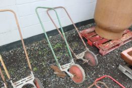 Two push hoes, one with small plough attachment