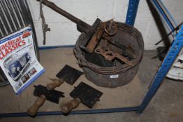 A quantity of horse related items including grooming items, a horseman's nose twitch, horse bits and