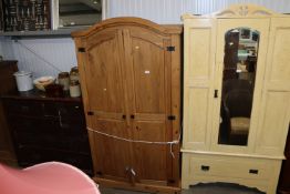 A modern pine two drawer wardrobe