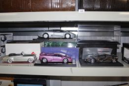 A Maisto Jaguar XJ220 1992 model, a model car of a McLaren with the certificate of authenticity,