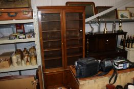 A mahogany display cabinet raised on cupboard base, AF