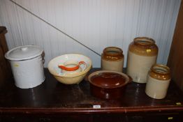 An enamel flower pot and cover, three stoneware jars and a Bewley pottery jug etc.