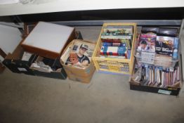 Six boxes containing keyboards, books, VHS tapes e