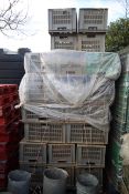 Pallet of stacking crates.