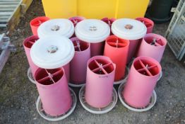 Quantity of hanging poultry feeders.