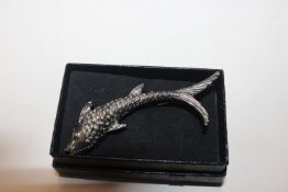 A vintage white metal leaping fish brooch, 16.5gms