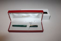 A cased Sheaffer ball point pen