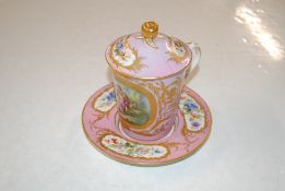 A Dresden covered cup and saucer, decorated with p