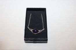 A vintage Celtic style Sterling silver and cabocho