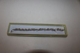 A vintage Sterling silver textured chain link brac