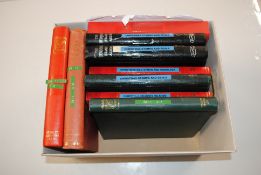 A box of Christmas seals and stamps in folders - s