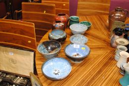 A collection of Studio pottery bowls and vases, mo