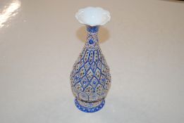 A Middle Eastern enamel decorated vase