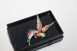 A vintage marcasite and enamelled silver parrot br