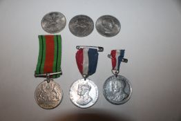 A WWII Defence medal, various other medals and coi