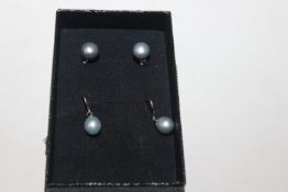 Two pairs of Sterling silver South Sea steel grey