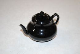 An English miniature black tea pot and cover