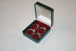 Four 925 silver dress rings set with white stones