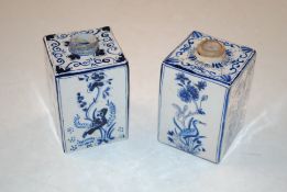 A pair of 19th Century possibly Delft cannisters