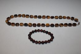 A Sterling silver and tigers eye 24