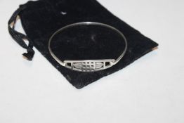 A Hallmarked Macintosh style front opening bangle