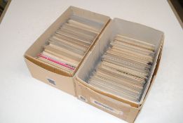 Two boxes of postcards