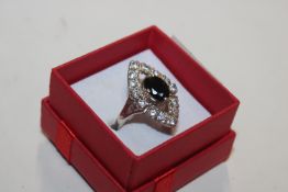 A vintage Sterling silver and black spinel set dre