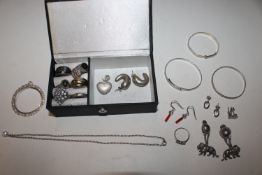 A collection of Sterling silver rings, earrings et