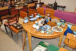 A mid-20th Century tiger stripe veneer style circu