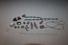 A collection of white metal jewellery; an oval pil