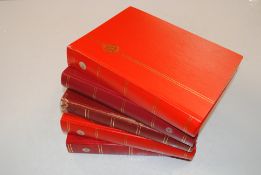 Five stock books of Christmas stamps mint and used