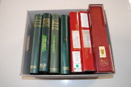 A box containing six albums of Isle of Man mint st