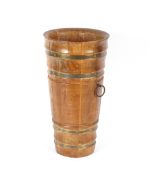 A Continental coopered butter carrier, flanked by ring handles, 49cm high